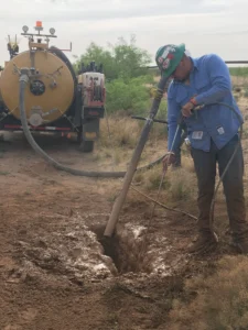 hydrovac excavation truck and worker